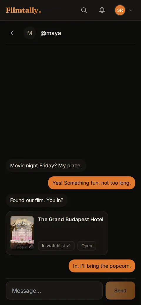 Messages on a phone: a chat with a friend, including a shared film card